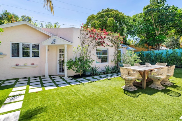 426 30th St, West Palm Beach, FL 33407 - view of yard with outdoor dining area and fence