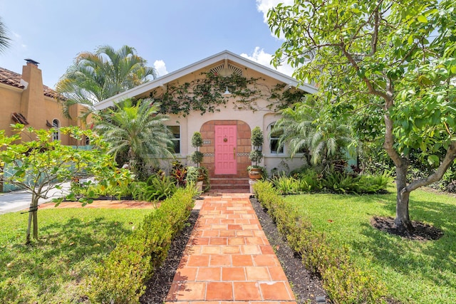 426 30th St, West Palm Beach, FL 33407 - view of front of home featuring a front lawn