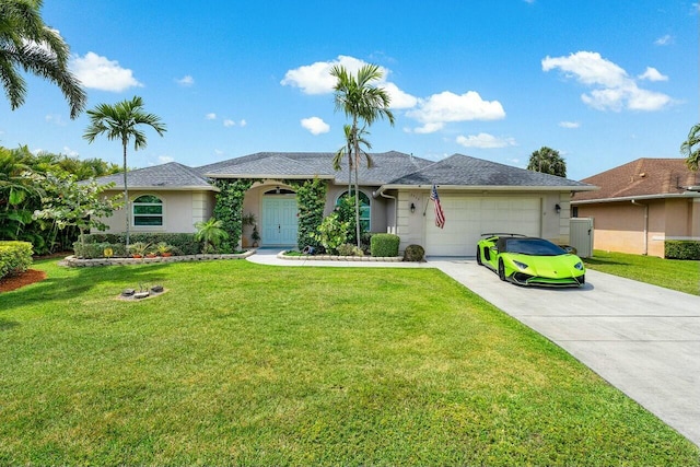 2999 Dovedale Ct, Wellington, FL 33414 - ranch-style home with stucco siding, an attached garage, concrete driveway, and a front yard