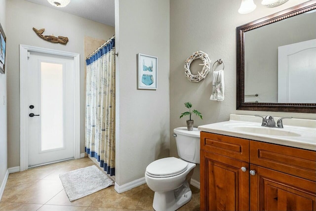2999 Dovedale Ct, Wellington, FL 33414 - full bath with a shower with curtain, vanity, toilet, baseboards, and tile patterned floors