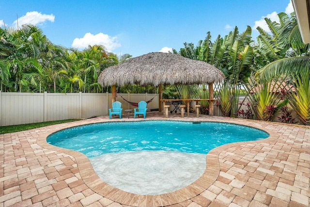 2999 Dovedale Ct, Wellington, FL 33414 - view of pool featuring a fenced backyard, a fenced in pool, a gazebo, and a patio area