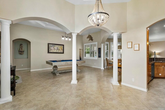 2999 Dovedale Ct, Wellington, FL 33414 - foyer with pool table, baseboards, a towering ceiling, and light tile patterned floors