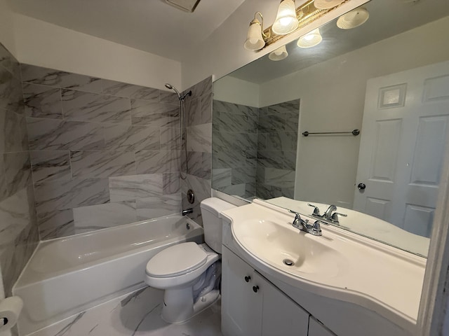 bathroom featuring shower / bathing tub combination, vanity, and toilet