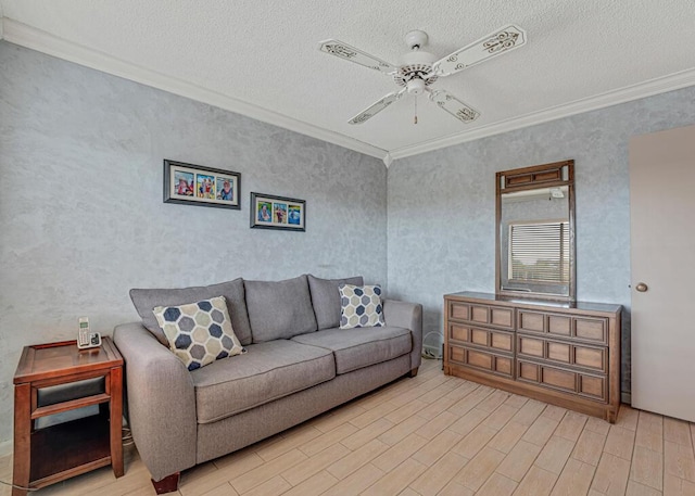 living room with a textured ceiling, crown molding, light wood-style flooring, and a ceiling fan