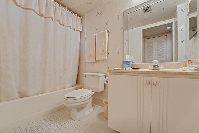 bathroom with visible vents, toilet, tile patterned floors, vanity, and shower / tub combo