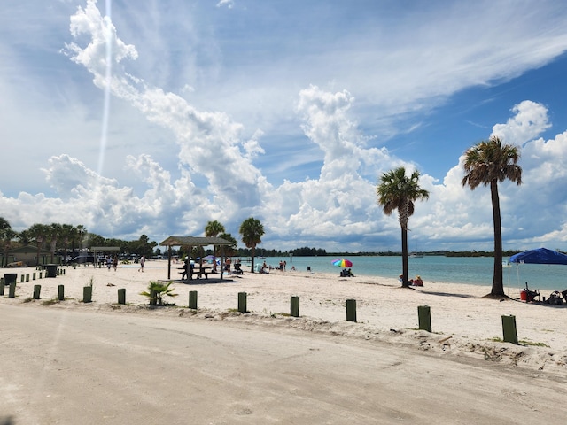 water view featuring a view of the beach and a gazebo
