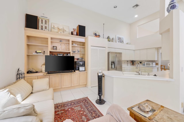 2502 NW 66th Dr, Boca Raton, FL 33496 - living room featuring light tile patterned flooring, visible vents, and recessed lighting