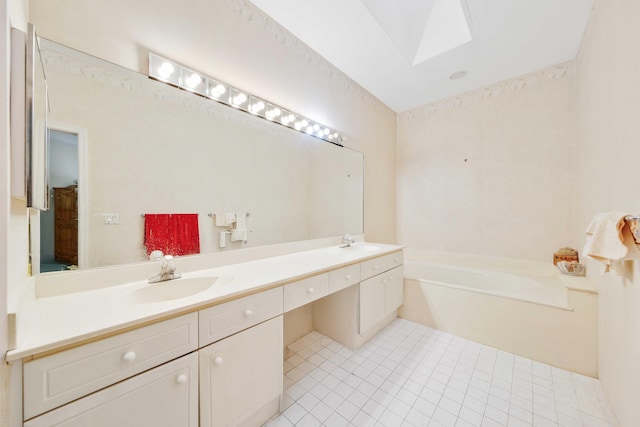 2502 NW 66th Dr, Boca Raton, FL 33496 - full bathroom featuring double vanity, a skylight, a garden tub, and a sink
