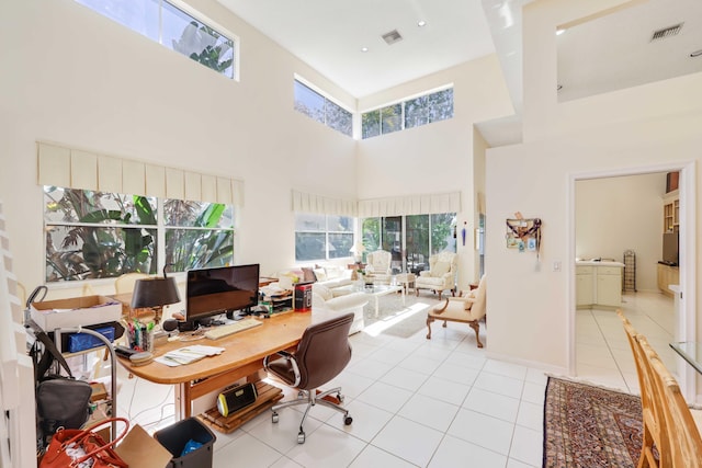 2502 NW 66th Dr, Boca Raton, FL 33496 - office area featuring light tile patterned floors, visible vents, and a high ceiling