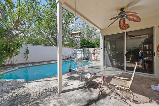 2502 NW 66th Dr, Boca Raton, FL 33496 - view of pool with a fenced in pool, a patio, a fenced backyard, and ceiling fan