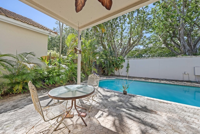 2502 NW 66th Dr, Boca Raton, FL 33496 - view of pool with a fenced in pool, a ceiling fan, a patio, and fence