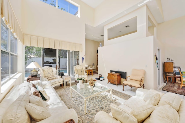 2502 NW 66th Dr, Boca Raton, FL 33496 - living room with tile patterned floors and a high ceiling