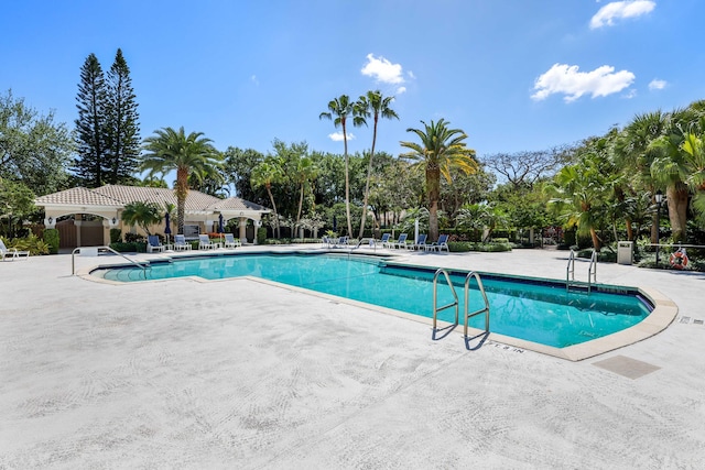 2502 NW 66th Dr, Boca Raton, FL 33496 - pool with a patio and fence