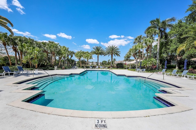 2502 NW 66th Dr, Boca Raton, FL 33496 - community pool featuring a patio area