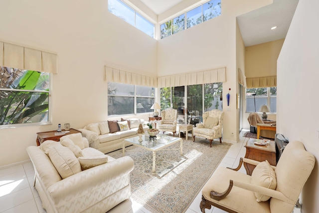 2502 NW 66th Dr, Boca Raton, FL 33496 - tiled living room featuring baseboards and a high ceiling