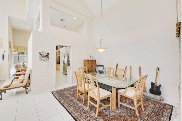 2502 NW 66th Dr, Boca Raton, FL 33496 - dining space with light tile patterned floors and high vaulted ceiling