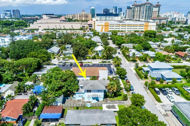 birds eye view of property with a city view