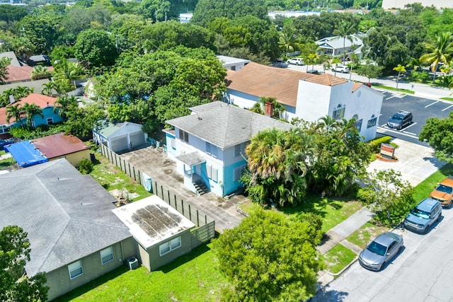 birds eye view of property with a residential view