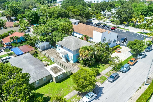 birds eye view of property with a residential view
