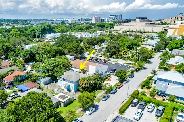 birds eye view of property with a city view