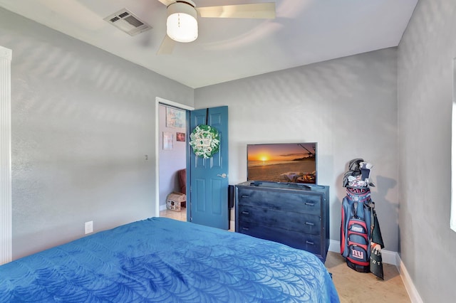 bedroom with visible vents, a ceiling fan, and baseboards