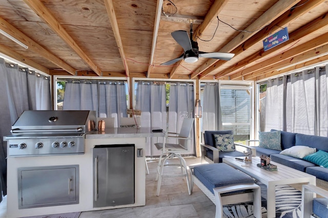 view of patio with grilling area, an outdoor kitchen, and outdoor lounge area