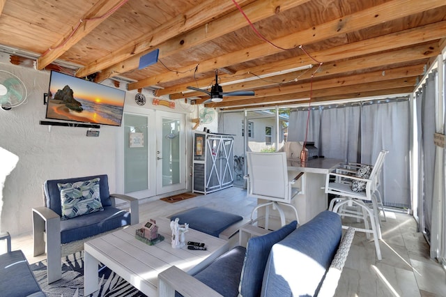 view of patio featuring an outdoor living space, french doors, outdoor dining space, and a ceiling fan
