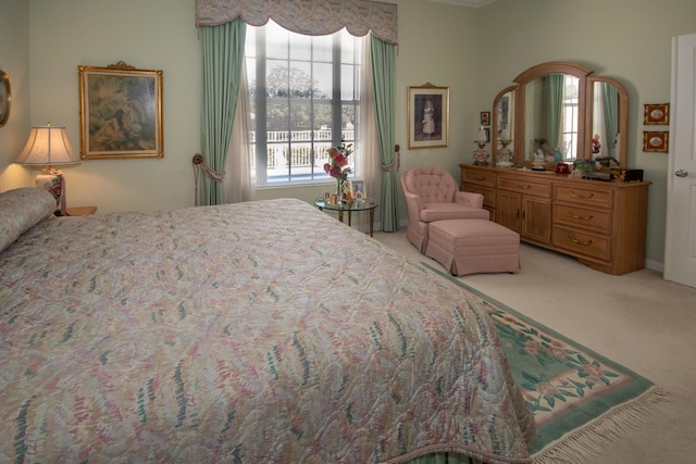 bedroom with light carpet