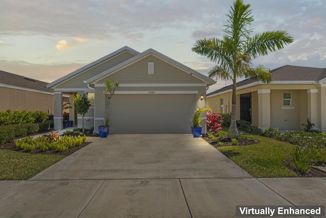 12164 SW Rimini Way, Port Saint Lucie, FL 34987 - single story home featuring driveway, stucco siding, and an attached garage