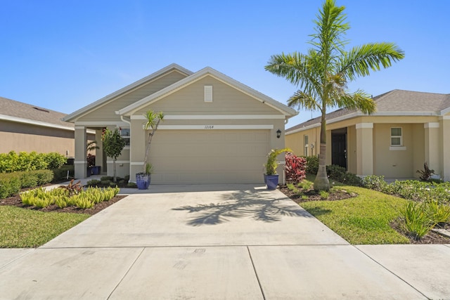12164 SW Rimini Way, Port Saint Lucie, FL 34987 - ranch-style home with driveway, stucco siding, and an attached garage