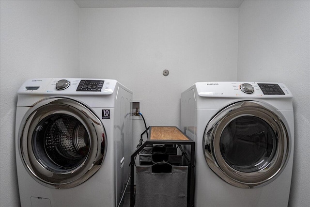 5879 NW Leah Dr, Port Saint Lucie, FL 34986 - laundry room with washer / clothes dryer