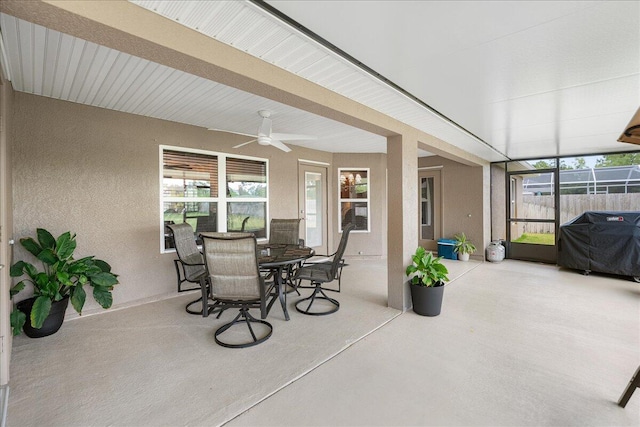 5879 NW Leah Dr, Port Saint Lucie, FL 34986 - sunroom with ceiling fan and outdoor dining area