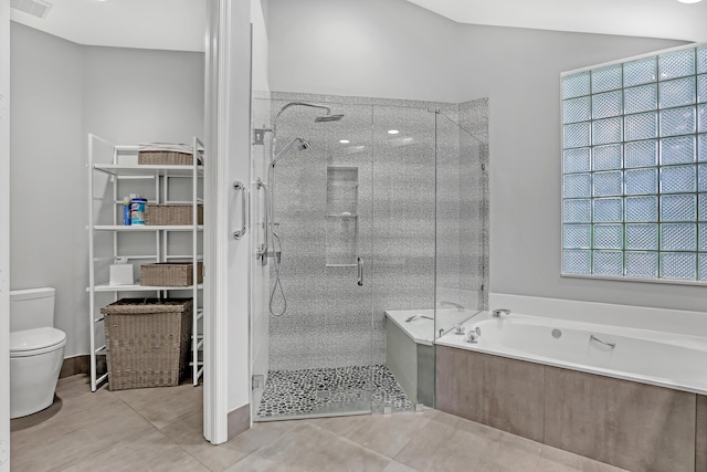6308 Crystal View Ln, Boynton Beach, FL 33437 - full bathroom with tile patterned flooring, toilet, a shower stall, visible vents, and a garden tub