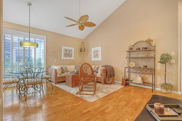 6308 Crystal View Ln, Boynton Beach, FL 33437 - living room with high vaulted ceiling, baseboards, a ceiling fan, and wood finished floors