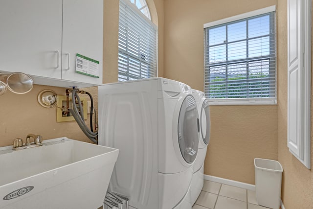 6308 Crystal View Ln, Boynton Beach, FL 33437 - laundry area featuring plenty of natural light, washer and clothes dryer, a sink, and cabinet space