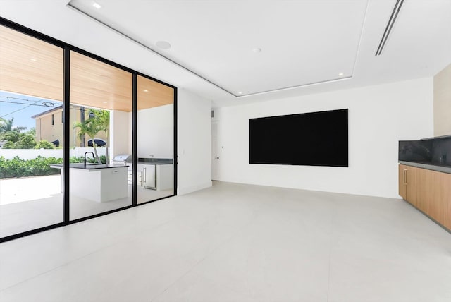 880 NE 3rd Ave, Boca Raton, FL 33432 - unfurnished living room featuring recessed lighting
