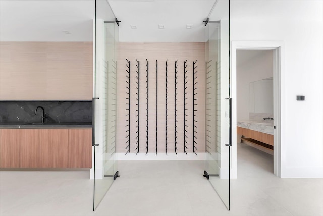 880 NE 3rd Ave, Boca Raton, FL 33432 - full bathroom featuring a shower stall, vanity, and backsplash