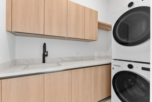 880 NE 3rd Ave, Boca Raton, FL 33432 - laundry room with cabinet space and stacked washer and clothes dryer