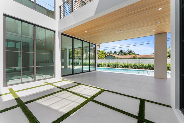 880 NE 3rd Ave, Boca Raton, FL 33432 - view of patio / terrace featuring fence