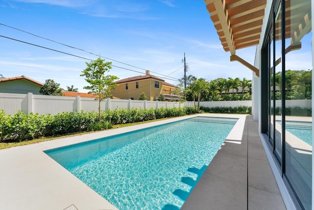 880 NE 3rd Ave, Boca Raton, FL 33432 - view of swimming pool featuring a fenced backyard