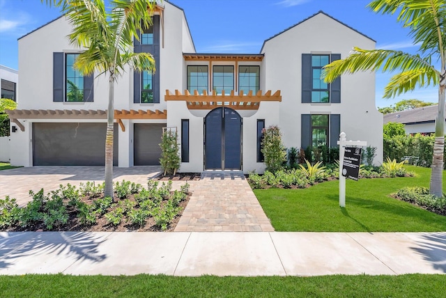 880 NE 3rd Ave, Boca Raton, FL 33432 - view of front facade with stucco siding, an attached garage, and decorative driveway