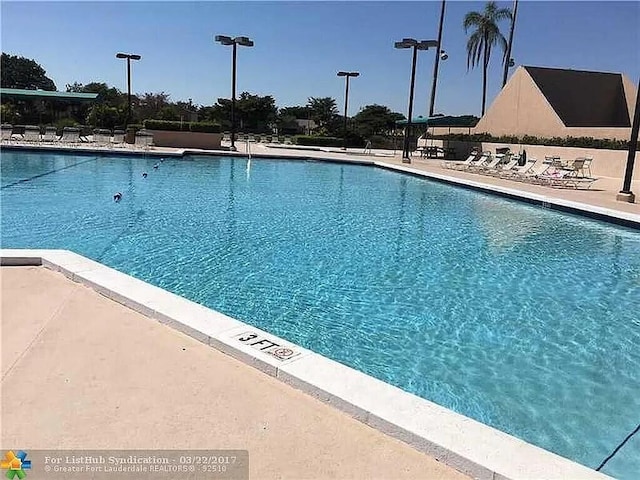 2231 NW 34th Ter, Coconut Creek, FL 33066 - pool with a patio area