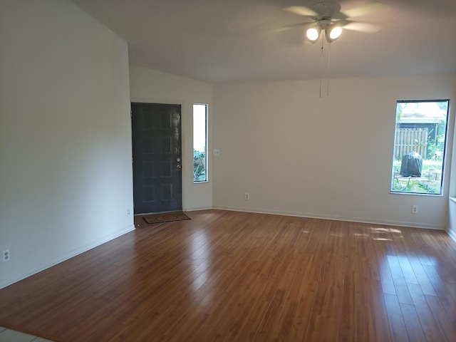 2231 NW 34th Ter, Coconut Creek, FL 33066 - empty room with baseboards, ceiling fan, and wood finished floors