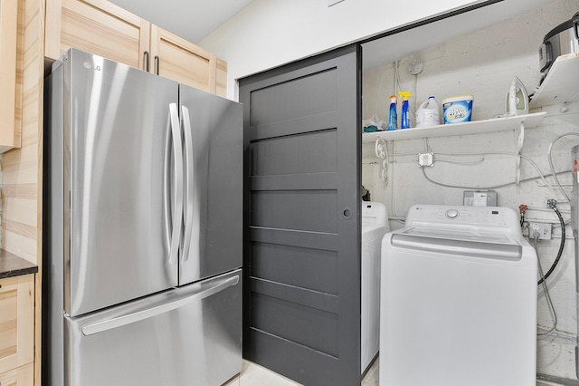 5400 NE 1st Ter, Oakland Park, FL 33334 - laundry room with laundry area and washer / dryer