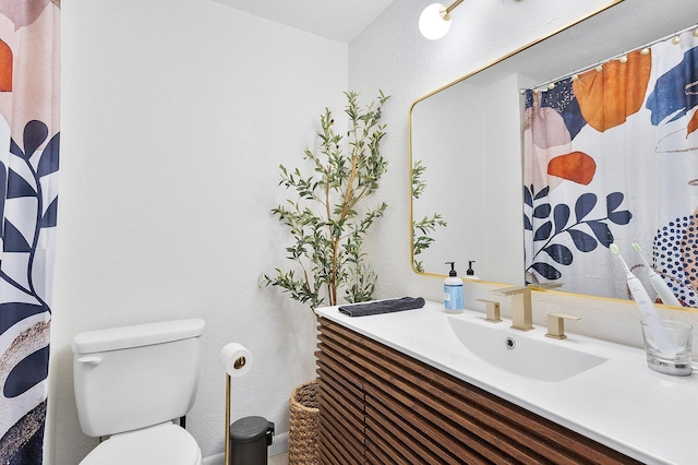 5400 NE 1st Ter, Oakland Park, FL 33334 - full bathroom featuring toilet and vanity