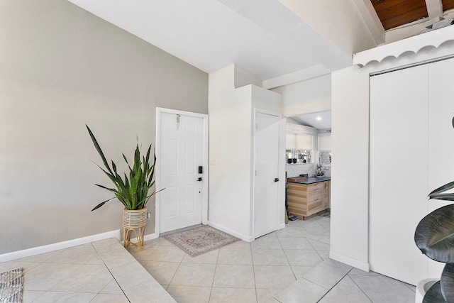 5400 NE 1st Ter, Oakland Park, FL 33334 - entrance foyer featuring light tile patterned floors and baseboards