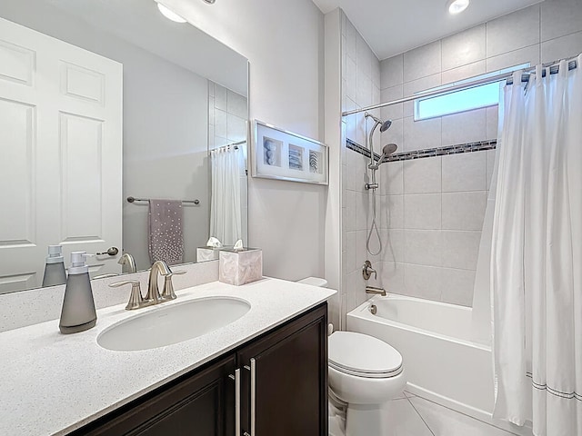 full bath featuring vanity, toilet, and shower / bath combo with shower curtain