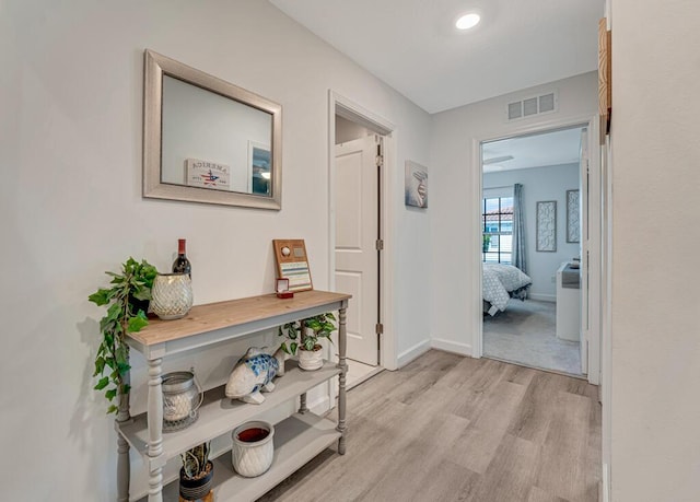 1012 Willow Pl, Riviera Beach, FL 33410 - corridor with light wood-type flooring and baseboards