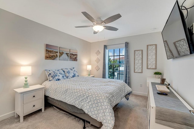 1012 Willow Pl, Riviera Beach, FL 33410 - bedroom with light carpet, baseboards, and a ceiling fan