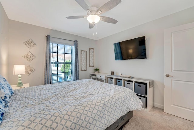 1012 Willow Pl, Riviera Beach, FL 33410 - bedroom featuring light carpet and ceiling fan